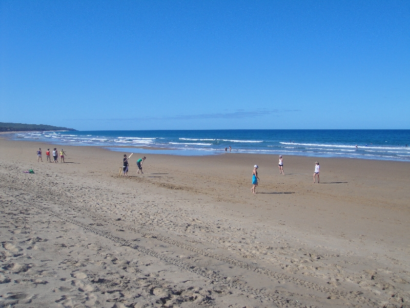 Surfers on Surf Beach in Agnes, Australia