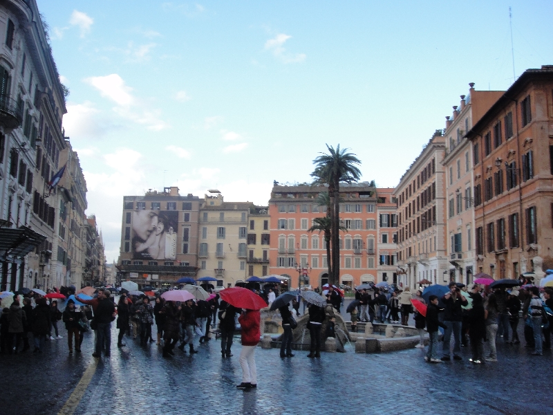 Umbrella crowd on Piazza di Spagna, Rome Italy