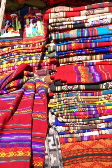 Fabrics at the market in Pisac, Cuzco Peru
