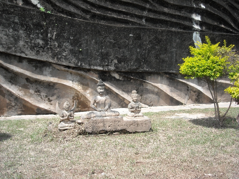 Little statues for Big Buddha, Laos