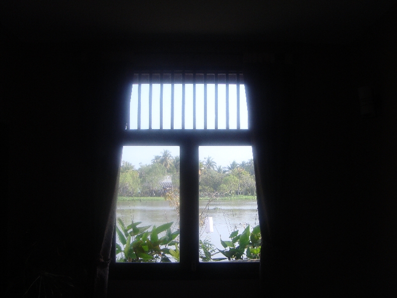 Hotel window looking out on the rive, Thailand