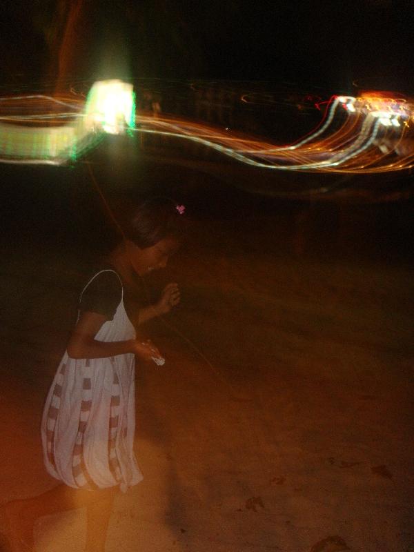 Thai kid playing on the beach, Thailand