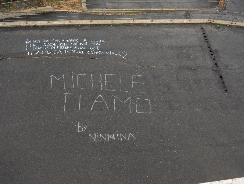 Lovers grafitti on the highway, Italy