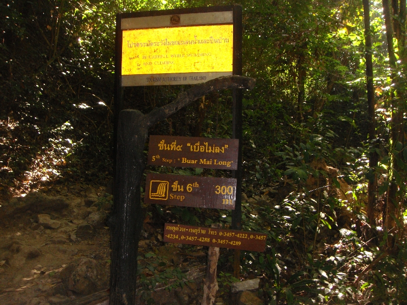 Hiking to the 5th and 6th Erawan tiers , Thailand