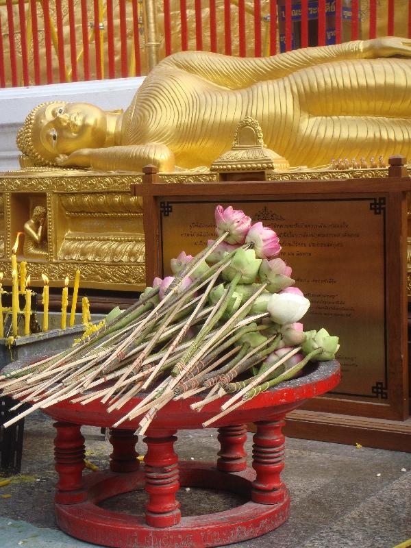 Flowers in front of the reclining Buddha, Chiang Mai Thailand