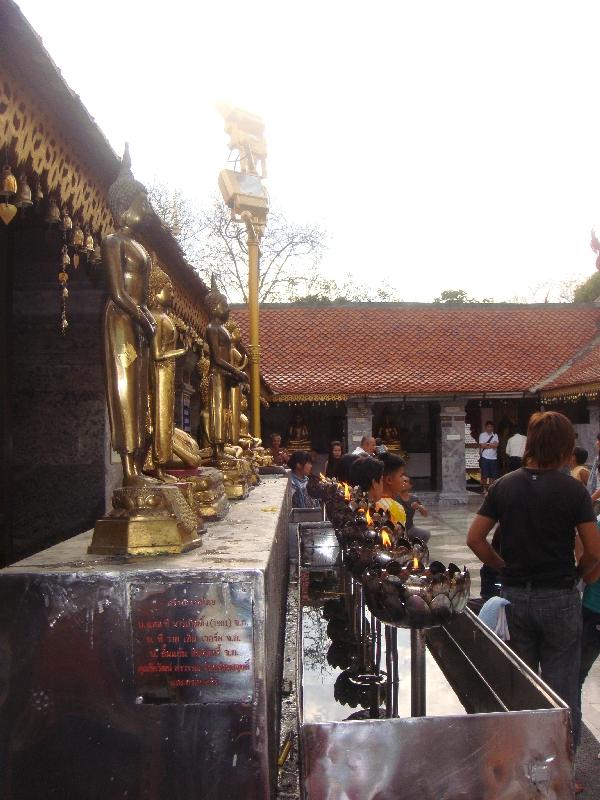 Thai locals bringing offerings, Thailand