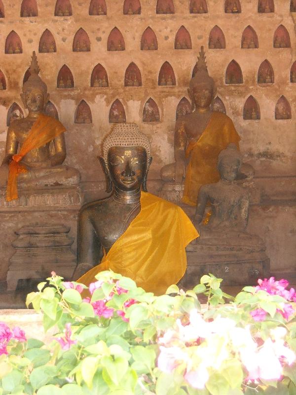 Silk draped Buddha statues, Vientiane Laos