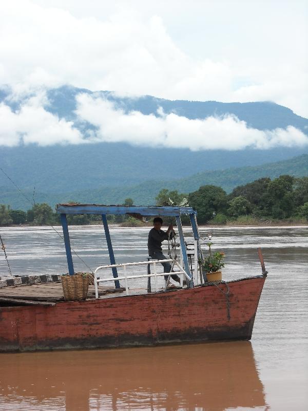 Cambodian ferry in the river, Preah Vihear Cambodia