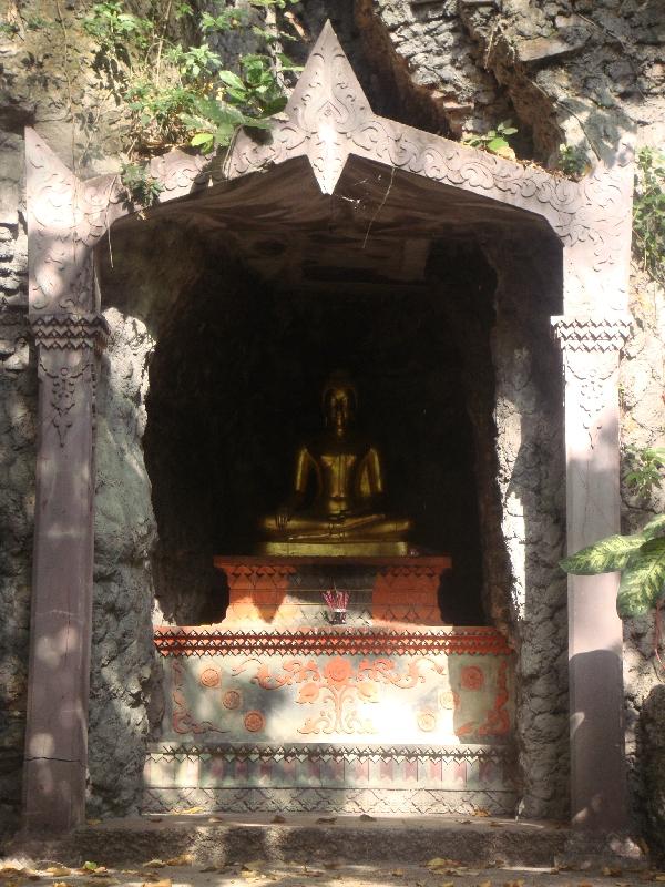 Buddhist altar in the trees, Thailand