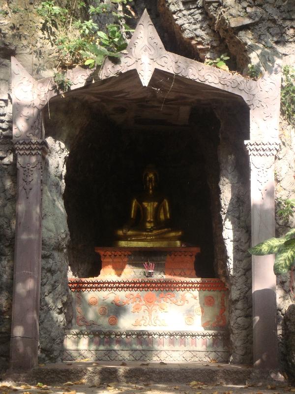 Bangkok Thailand Buddhist altar in the trees