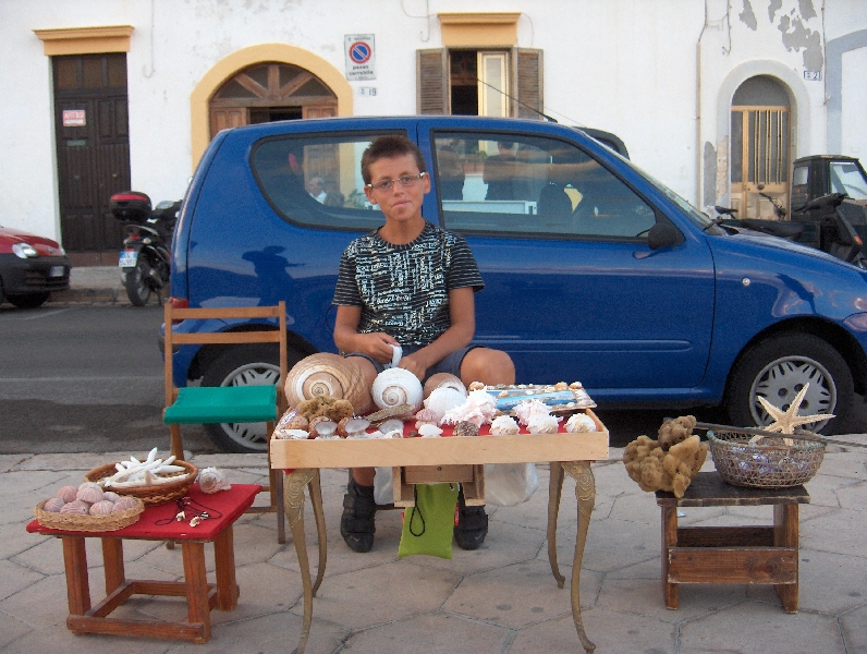 Local boy selling sea shells, Gallipoli Italy