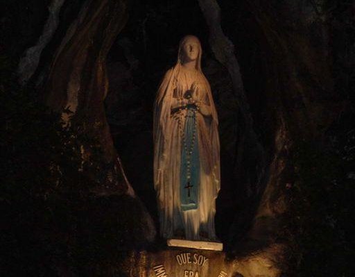 The Grotto in Lourdes by night, France