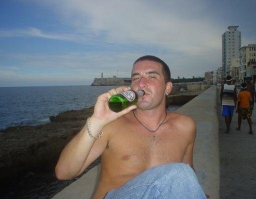 Having a drink on Malecon de la Habana, Cuba., Havana Cuba