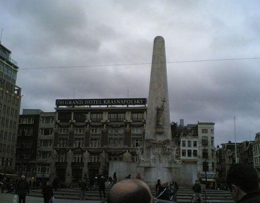 Amsterdam Netherlands Statue memorial The Unity on Dam Square in Amsterdam.