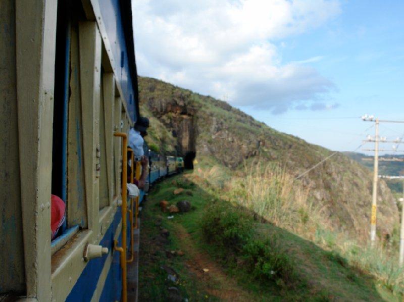 People watching out of the train windows, India., India