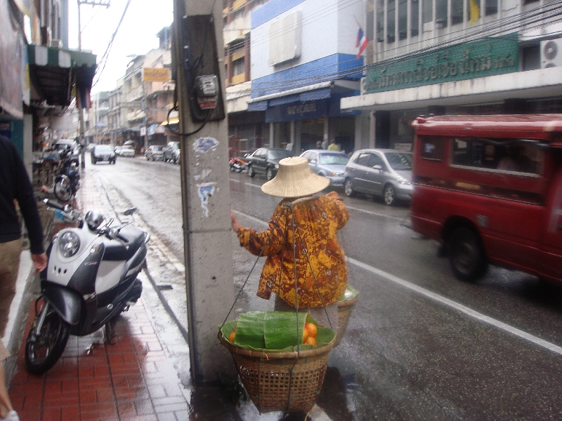 Thai woman selling oranges in Chiang Mai