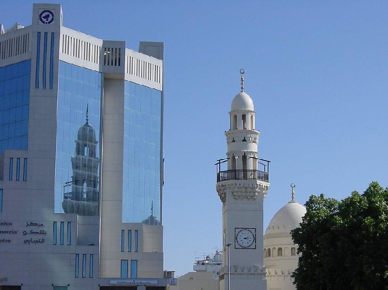 Photo of the NBB Tower and the Yateem Mosque in Manama, Manama Bahrain