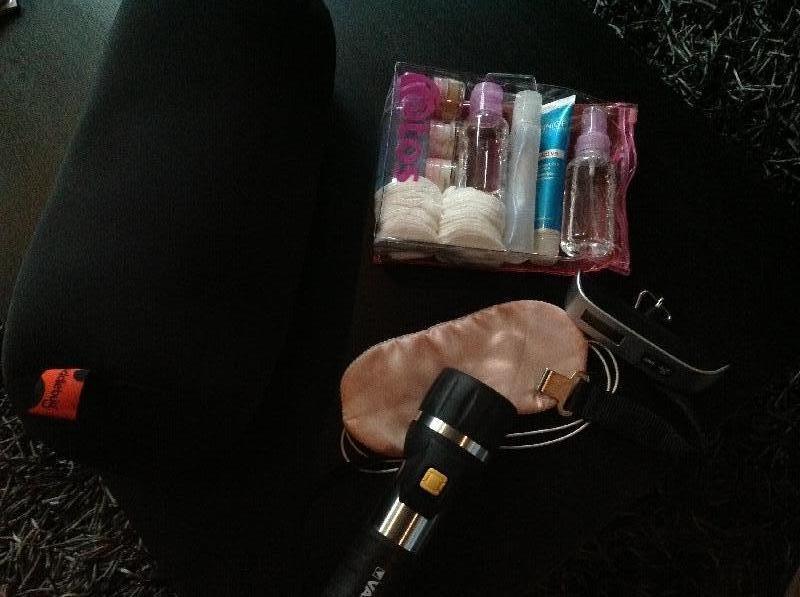 Kilimanjaro Airport Road Tanzania Flashlight,back pillow, mobile scale and toiletries