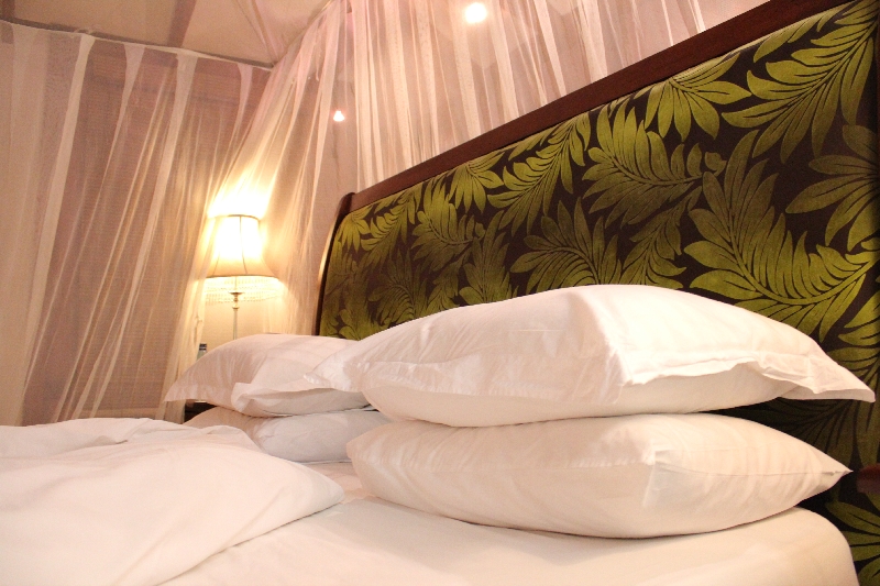 Bed made at Arusha Coffee Lodge, Arusha Tanzania