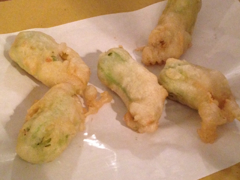 Friend zucchini flowers with mozzarella and anchovies, Italy