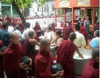 Monks in Amarapura coming together to eat and protest. 