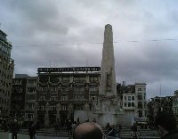 Statue memorial The Unity on Dam Square in Amsterdam.