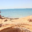 Red cliffs and turqoise waters