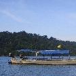 Ko Similan Thailand A Longtai in the water at Khao Lak