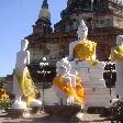 White Buddhist statues covered in silk
