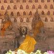 Silk draped Buddha statues