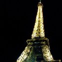 Photo of the Eiffel Tower at night.