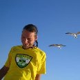 Miami United States Feeding the hungry birds on the beach in Miami.