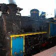 The engines of an Indian steam train.