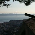 Lisbon Portugal Old canon in Lisbon with a view of the Lisbon Bridge 